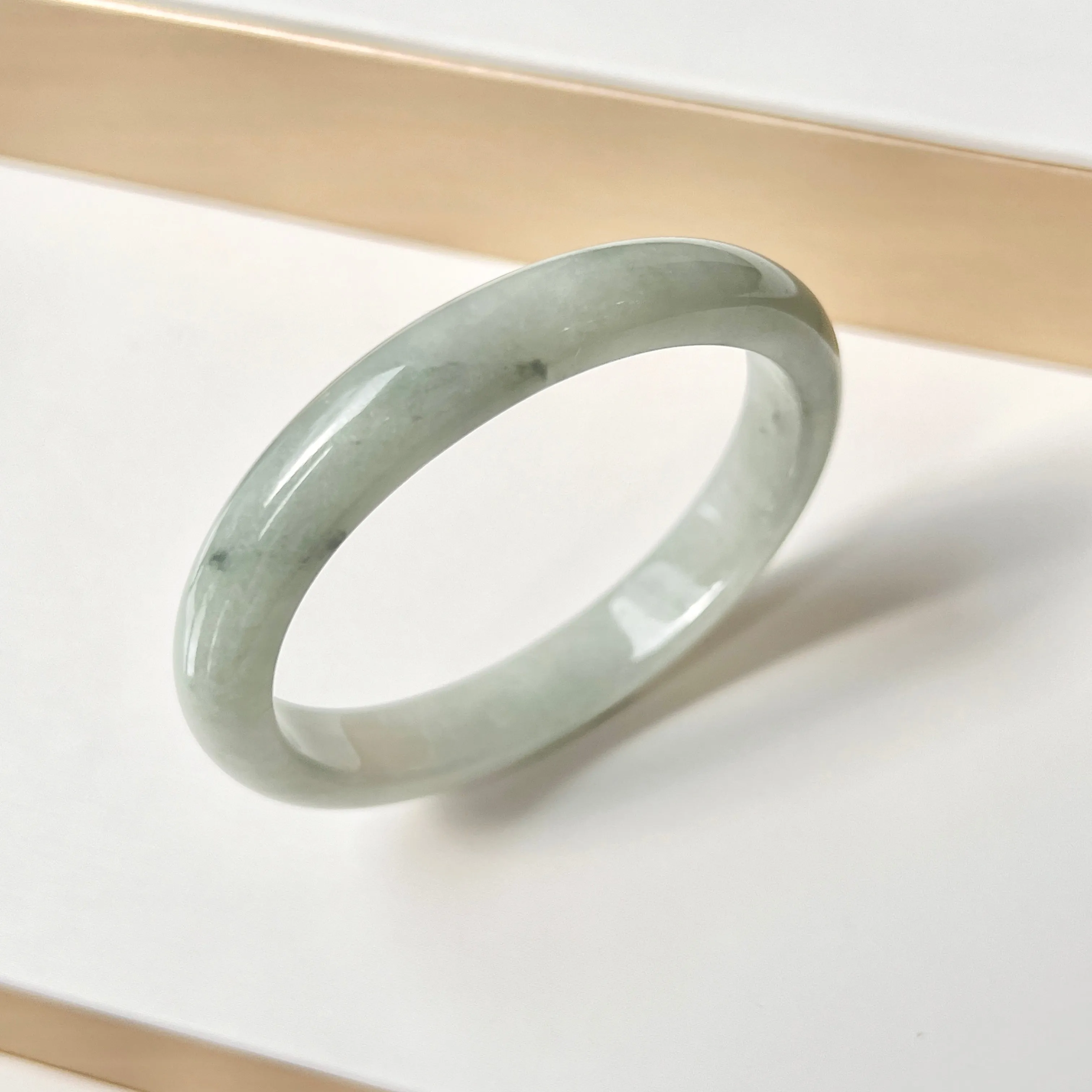 SOLD OUT: 50.5mm A-Grade Natural Bluish Green Floral Jadeite Modern Oval Bangle No. 152003