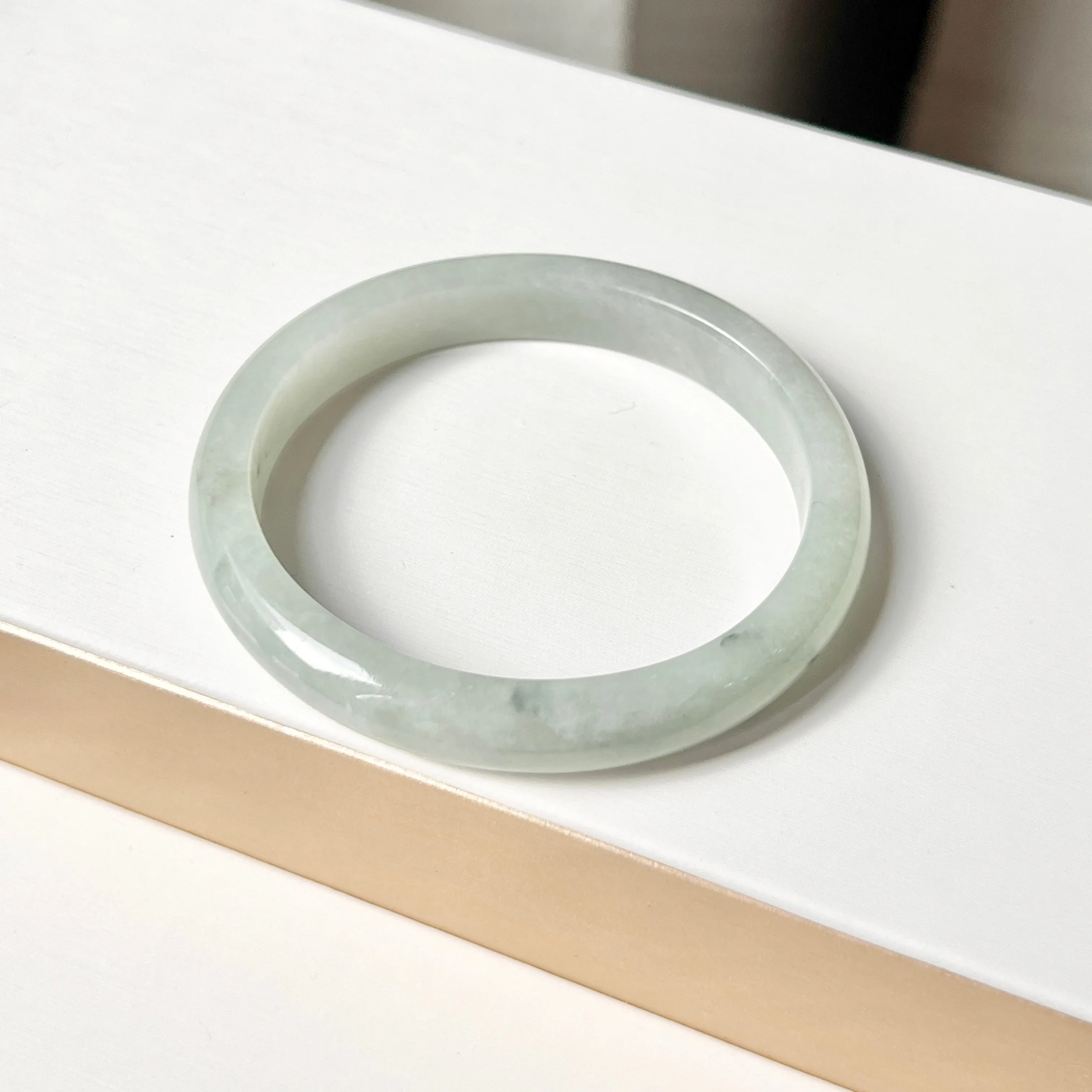 SOLD OUT: 50.5mm A-Grade Natural Bluish Green Floral Jadeite Modern Oval Bangle No. 152003